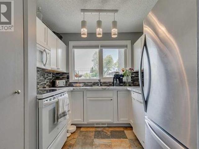 12 64 Street Nw, Calgary, AB, T2K 1B8 townhouse for sale | Listing ID A2225 | Royal LePage