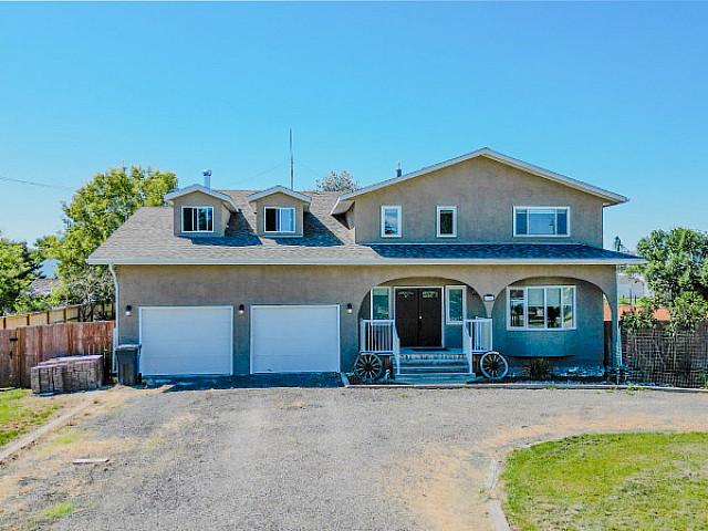 1/2 Acre Two storey Magrath Home Available!