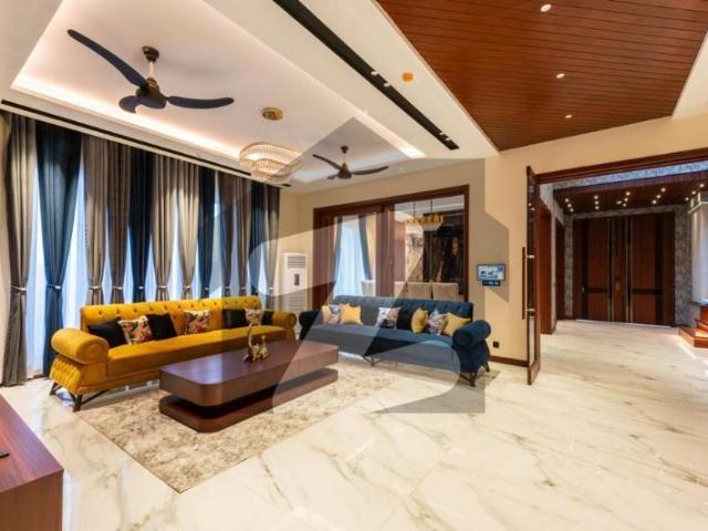 12 marla brand new eye catching ultra modern bungalow for sale near to raya in low price dha phase 7 block x