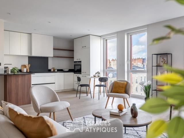 138 m² de volumes et lumière dans un duplex d'exception Place de Bretagne