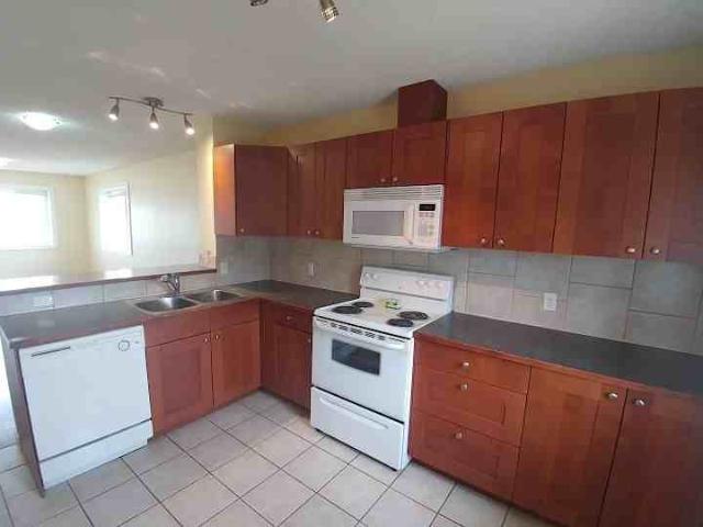 1506 40 Street SE Main 2 Bedroom Apartment for Rent at 1506 40 St Se, Calgary, AB T2A 1K2 Forest Heights