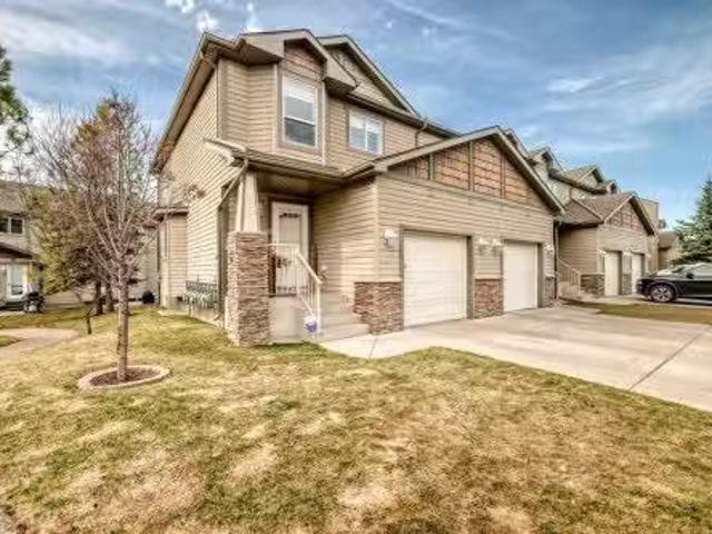 15 Spring Meadows Bay, Okotoks, AB, T1S 2G8 townhouse for sa.