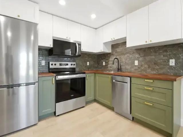 1 Bedroom Apartment Cochrane AB 104182269