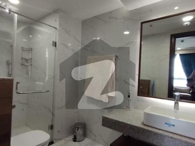 1 bedroom + maid room with powder room fully furnished toop floor apartment available for rent penta square by dha lahore