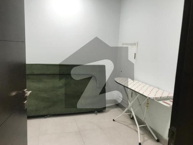1 bedroom with maid room+ powder room fully furnished apartment available for rent penta square by dha lahore