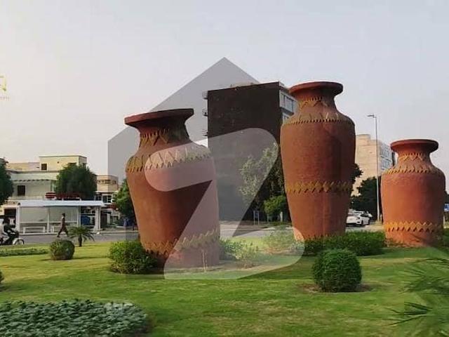 1 kanal On Ground Possession Utilities Paid Builder Location Plot For Sale In BABAR Block Bahria Town Lahore