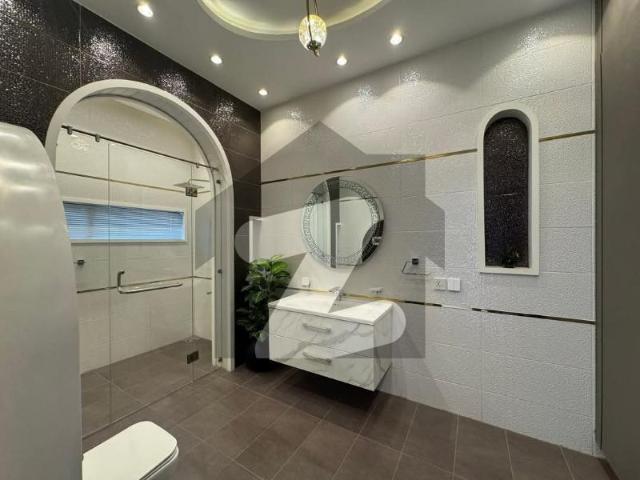1 kanal brand new type house on main canal road for rent johar town