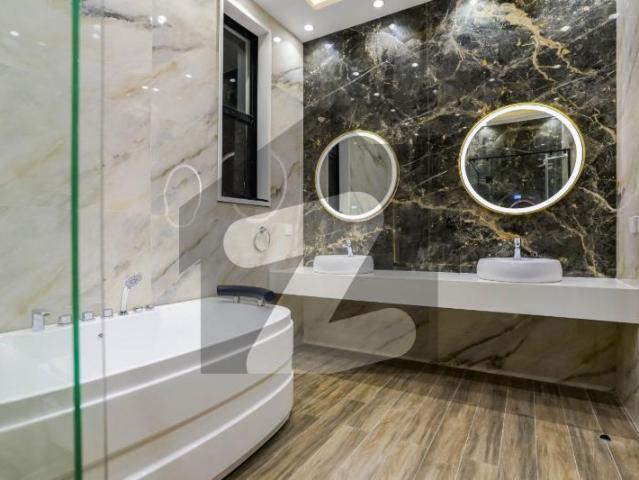 1 kanal brand new ulrta modren design with besment house for sale dha phase 7 block u