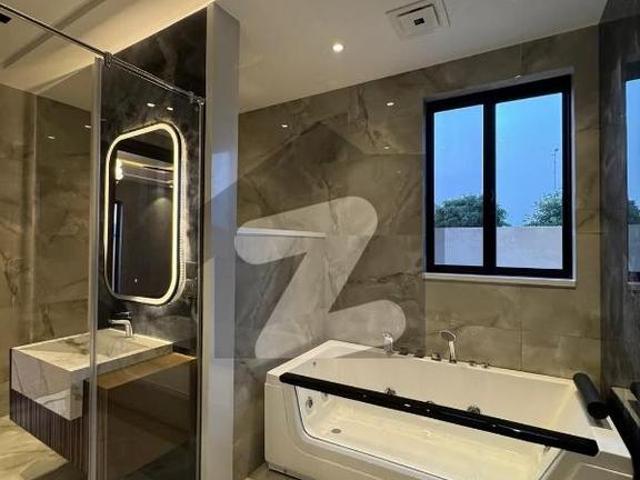 1 Kanal Brand New House For Rent Available IN DHA Eme Society Location D Block 5 Master Bedroom 2 TV Lounge 2 Kitchen Drawing Room Dining Store Terrace Laundry Area Garage Rent 250000 EME Society