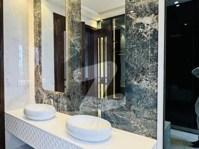 1 kanal brand new modern house with luxury feathers of cunstruction and also modern decent living style valencia block c