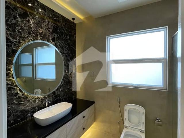 1 Kanal Designer Brand New House Available For Sale Just 30 Second Drive From The Main Gate!