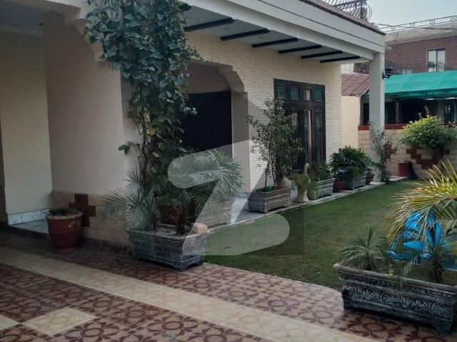 1 kanal elegant and fully maintained super hot located bungalow is available in the best block of dha lahore | separate entrance