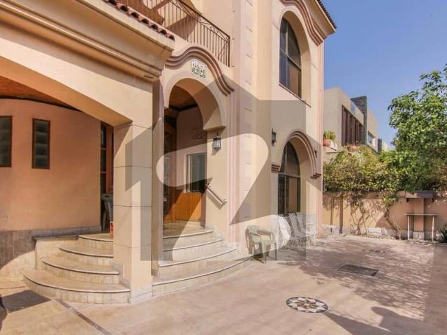 1 kanal elegant and fully maintained super hot located bungalow with basement is available in the best block of dha lahore