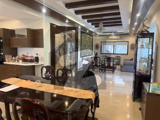 1 kanal elegant and fully furnished with golf view house for rent in dha raya defence raya