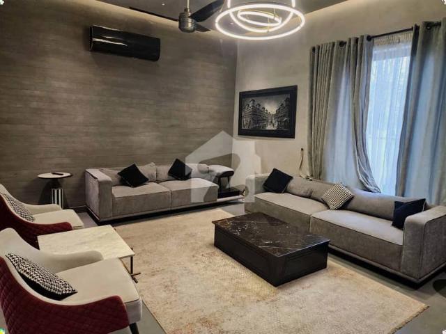 1 kanal elegant and fully furnished super hot located bungalow with basement is available in the best block of dha lahore