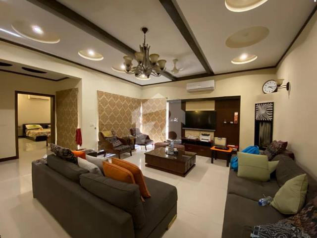 1 kanal elegant and fully furnished super hot located bungalow with 10 kw solar is available in the best block of dha lahore