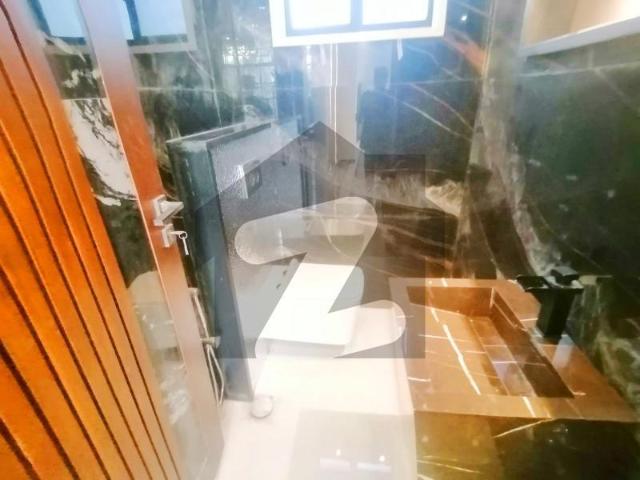 1 kanal rand new modern house with luxury feathers of cunstruction and also modern decent living style valencia block c