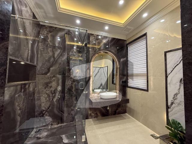 1 Kanal Semi Furnished Spanish Design Luxury Bungalow Design By Faisal Rasul Available for Sale in DHA Phase 6 Near Dolmen Mall. DHA Phase 6