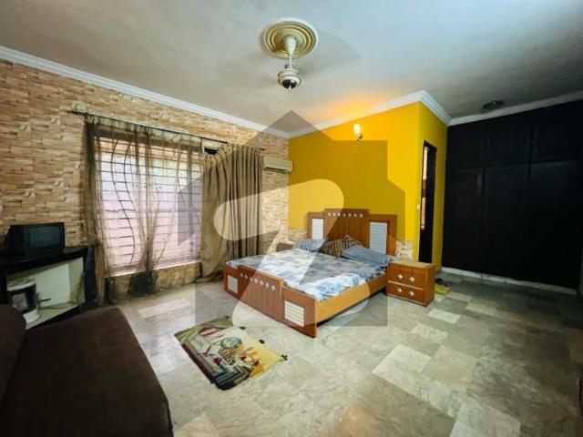 1 Kanal Single Story House with beautiful Lawn. At investor Price DHA Defence Phase 2