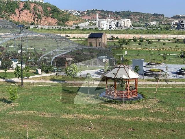 1 kanal solid and level land plot at jinnah boulevard near roundabout prime location plot