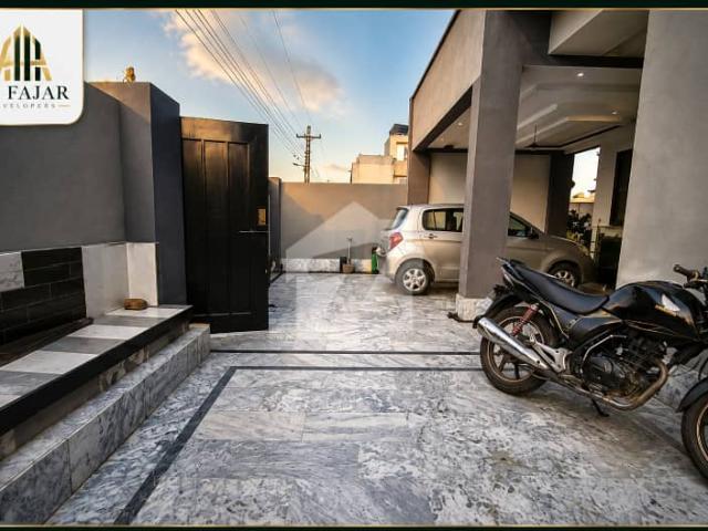 1 Kanal Triple Storey Luxury Designer House | Main 100 Ft Road | Near Mosque & Park | Solar Installed | AWT Phase 2 Lahore
