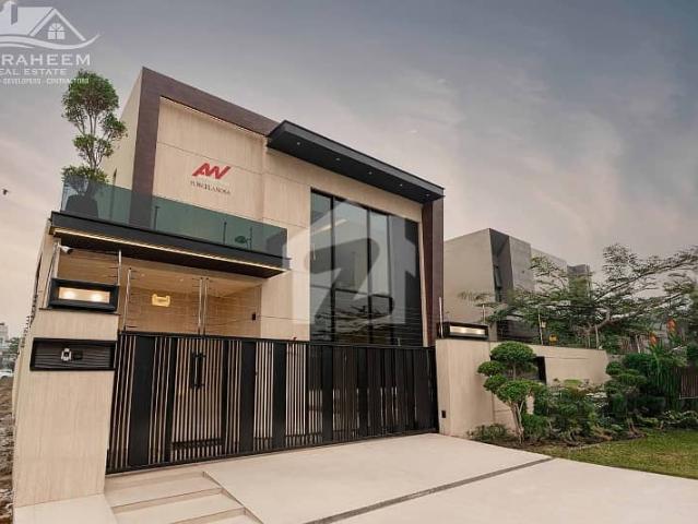 1 Kanal Ultra Modern Mansion On 100 feet Road With & Cinema With Rooftop Garden & Solar & Private Office A Rare Gem In The Current Market