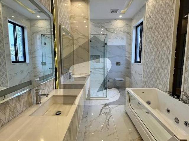 1 kanal 7 bedrooms most luxury full house with full basement, 2 big halls available for rent near swimming pool dha phase 5 block k