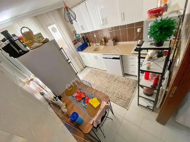 1.kat_ön_cephe_asansörlü_iskanlı_çift_balkon_manzaralı_kök_tapu