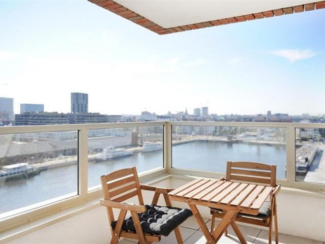 1 slaapkamerappartement met terras en zicht op het Kattendijkdok