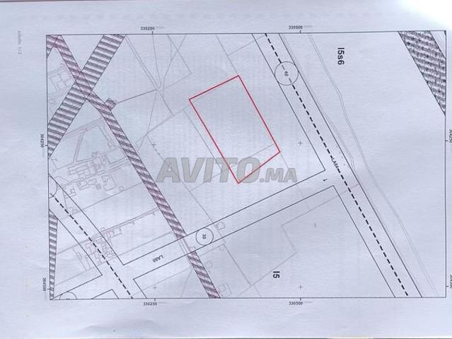 Terrain ZAE I5 titré à vendre à Lahraouiyine