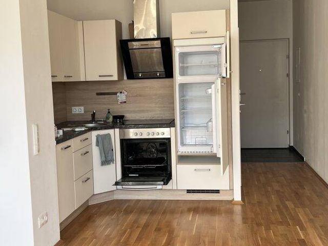 1,5 Zimmer Wohnung mit Gartenterrasse in generalsaniertem Neubau mit 11m2 Terrasse und einer tollen Raumhöhe!