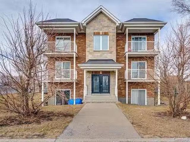202 325 Place Trianon, Brossard, QC, J4W 3K1 condo for sale.