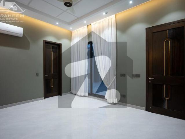 20 marla brand new ultra modern bangalow with home cenima for sale near to park. DHA Phase 7 Block U