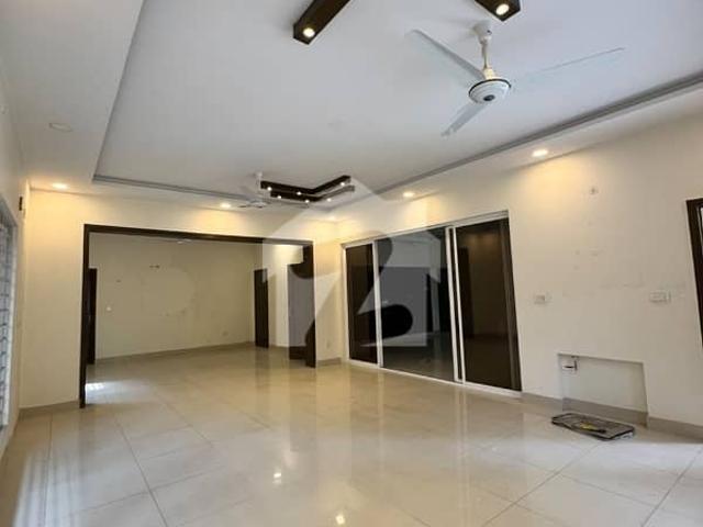 20 MARLA HOUSE AVAILABLE FOR RENT F 11 ISLAMABAD Premium Spacious Ideal Family Residence 5 Spacious Bedrooms 6 Attached Bathrooms 2 Drawing & Dining Areas 2 TV Lounges 1 Spacious Kitchen Parking for 23 Cars Separate Gas & Electricity Meters Water Supply Available Boring Water Available Excellent & Spacious Layout Ideal for a Decent Family Prime Location F 11 Islamabad