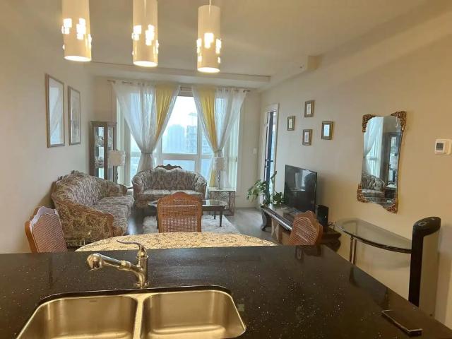20th Floor 1 Bed + Den Condo – South Views & Direct LRT Access!