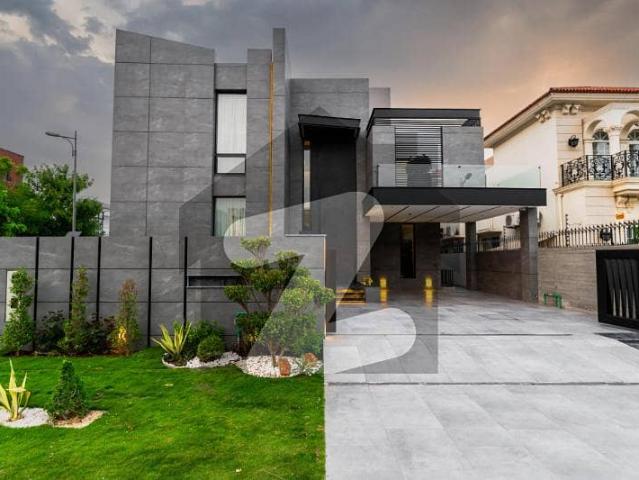 21.25 Marla Corner House Land Area: 4,800 sqft Covered Area: 9,490 sqft Solar installed, Internet installed Near CCA commercial area, Dolmen Mall, and other necessary amenities For Sale In C Block DHA Phase 6 Lahore