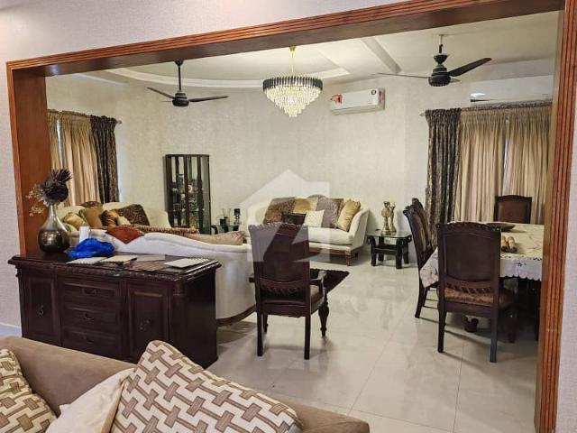 21 Marla Corner Slightly Used Ultra Modern Designer Owner Build Fully Furnished 2 Servant Quarter In Basement Bungalow 10KV Solar Installed For Sale At Prime Location Of DHA Lahore Near To Park Masjid & Commercial Market