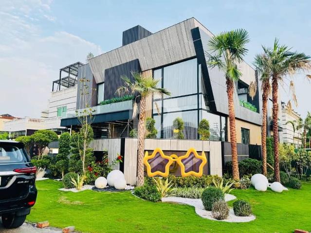 22 Marla Brand New Corner Luxury Ultra Modern Design Most Beautiful Full Basement Fully Furnished Home Theatre Swimming Pool Lift Bungalow For Sale At Prime Location Of DHA Lahore Near To Park Masjid & Defence Raya Fairways Commercial