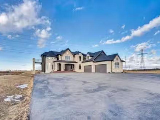 232138 Range Road 282, Rural Rocky View County, AB, T1X 1X4.