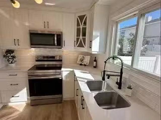 232 Deerpoint Se, Calgary, AB, T2J 6M7 townhouse for sale L.