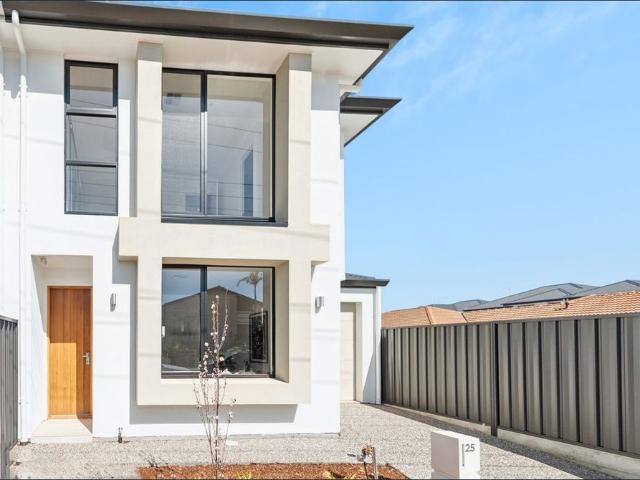 Brand New Modern 3 Bedroom Townhouse with City & Beach at Your Doorstep!