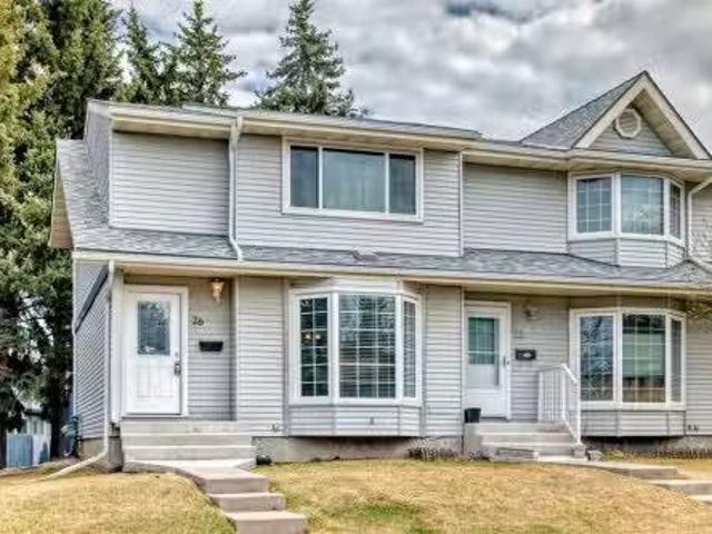26 Bernard Drive Nw, Calgary, AB, T3K 2K3 townhouse for sale.