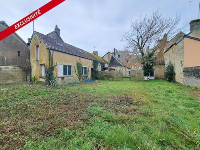 2 maisons, plein centre ville sur un terrain clos
