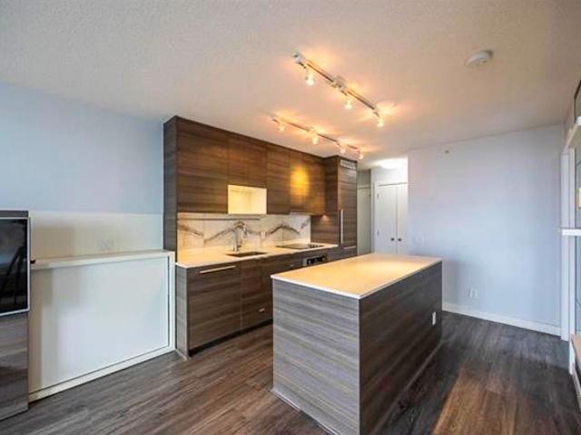 2 Bed Condo | Surrey University District | Parking • Den