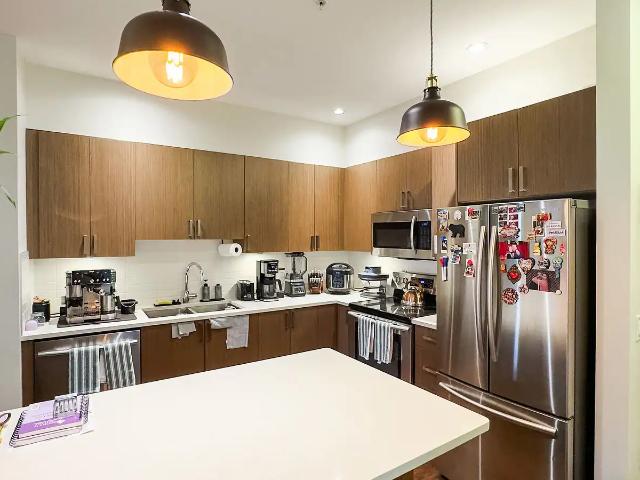 2 Bed + Den | 2 Bath Condo w/ Heated Floors | Parking + Lake Access