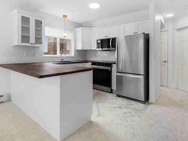 2 Bedroom Condo for Rent at 7451 Mountain View Terraces, Calgary, AB T3H 4K5 Springbank Hill