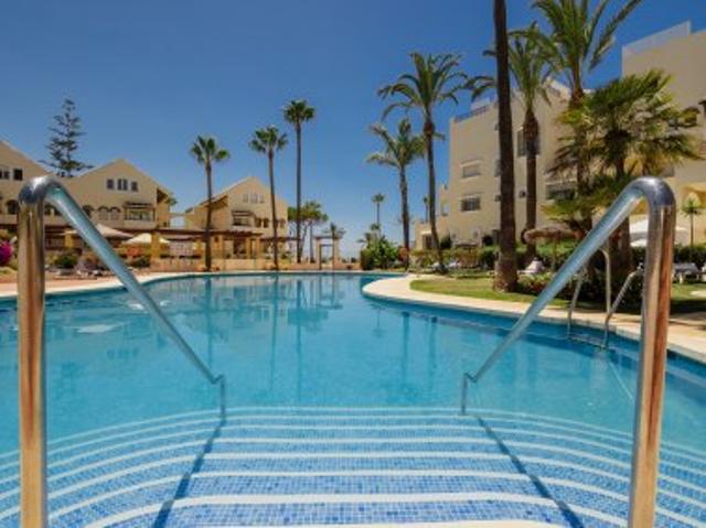 2 bedroom beachside apartment in Elviria, Marbella East with communal pool and terrace