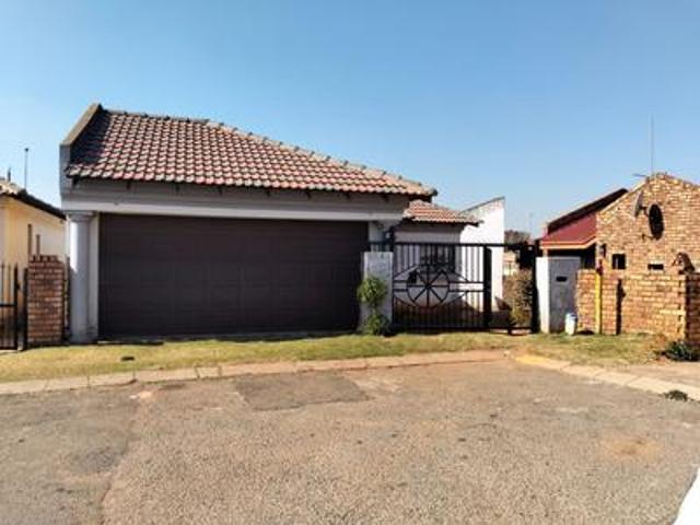 2 bedroom house with income generati.