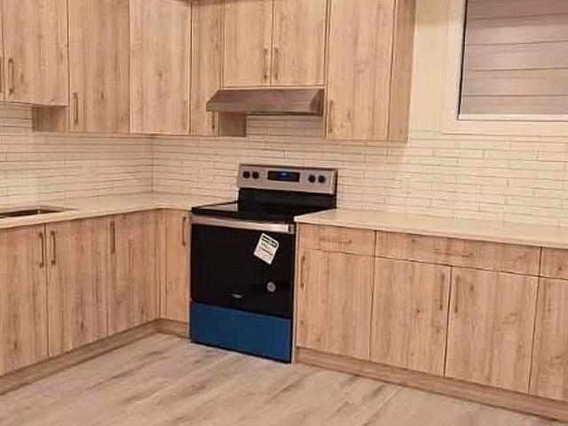 2 Beds 1 Bath Legal Basement Suite chestermere corner Lot