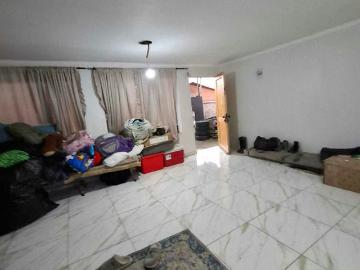 2 casas con galpon, gran terreno y comercial 1622 | Dormitorios por 310000. 00 en Santiago